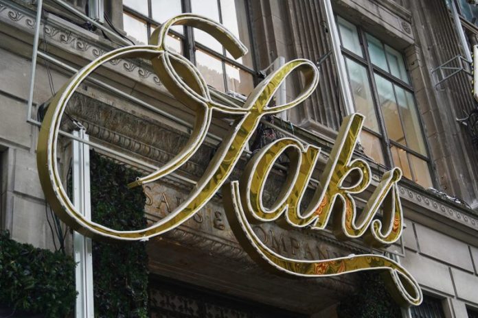 <p id='anchor-6de427' class='body-graf'>The company that owns the iconic luxury retailer Saks Fifth Avenue filed for bankruptcy late Tuesday.</p>
<p id='anchor-211ff8' class='body-graf'>The move comes after Saks Global struggled with debt it took on to buy rival Neiman Marcus, lagging department store sales and a rising online market.</p>
<div id='taboolaReadMoreBelow'></div>
<p id='anchor-0ab222' class='body-graf'>It’s one of the largest retail collapses since the Covid pandemic, and casts further doubt over the future of luxury fashion.</p>
<p id='anchor-1d5b76' class='body-graf'>The retailer, which also owns Bergdorf Goodman, said early Wednesday its stores would remain open for now after it finalized a $1.75 billion financing package and appointed a new CEO.</p>
<p id='anchor-52141d' class='body-graf'>The court process is meant to give the luxury retailer room to negotiate a debt restructuring with creditors or sell itself to a new owner to stave off liquidation. Failing that, the company may be forced to shutter.</p>
<p id='anchor-e4fda6' class='body-graf'>Former Neiman Marcus CEO Geoffroy van Raemdonck will replace Richard Baker, who was the architect of the acquisition strategy that left Saks Global saddled with debt.</p>
<p id='anchor-09534b' class='body-graf'>The company also appointed former Neiman Marcus executives Darcy Penick and Lana Todorovich as chief commercial officer and chief of global brand partnerships at Saks Global, respectively.</p>
<p id='anchor-015425' class='body-graf'>Saks Fifth Avenue, the retail arm of Saks Global, listed $1 billion to $10 billion in assets and liabilities, according to court documents filed in U.S. Bankruptcy Court in Houston.</p>
<p id='anchor-6f4c30' class='body-graf'>A retailer long loved by the rich and famous, from Gary Cooper to Grace Kelly, Saks fell on hard times after the pandemic, as competition from online outlets rose, and brands started more frequently selling items through their own stores.</p>
<p id='anchor-2aa3e4' class='body-graf'>The original Saks Fifth Avenue store, known for displaying the likes of Chanel, Cucinelli and Burberry, was opened by retail pioneer Andrew Saks in 1867.</p>
<p id='anchor-199720' class='body-graf'>The new financing deal would provide an immediate cash infusion of $1 billion through a loan from an investor group, Saks Global said. </p>
<p id='anchor-333816' class='body-graf'>A host of luxury brands were among the unsecured creditors, led by Chanel and Gucci owner Kering at about $136 million and $60 million respectively, the court filing said. The world’s biggest luxury conglomerate, LVMH, was listed as an unsecured creditor at $26 million. In total, Saks Global estimated there were between 10,001 and 25,000 creditors.</p>
<p id='anchor-f416c8' class='body-graf'>In 2024, Baker had masterminded the takeover of Neiman Marcus by Canada’s Hudson’s Bay Co, which had owned Saks since 2013, and later spun off the U.S. luxury assets to create Saks Global, bringing together three names that have defined American high fashion for more than a century.</p>
<p id='anchor-92ab44' class='body-graf'>The deal was designed to create a luxury powerhouse, but it saddled Saks Global with debt at a time when global luxury sales were slowing, complicating an already difficult turnaround for CEO and veteran executive Marc Metrick.</p>
<p id='anchor-c36395' class='body-graf'>Saks Global struggled last year to pay vendors, who began withholding inventory, disrupting the company’s supply chain and leaving it with insufficient stock.</p>
<p id='anchor-e03e33' class='body-graf'>The thinly stocked shelves may have driven shoppers away to rivals like Bloomingdale’s, which posted strong sales in 2025, compounding pressure on Saks Global.</p>
<p id='anchor-fbe28d' class='body-graf'>“Rich people are still buying,” Morningstar analyst David Swartz said last month, “just not so much at Saks.”</p>
<p id='anchor-952037' class='body-graf'>Running out of cash, Saks Global last month sold the real estate of the Neiman Marcus Beverly Hills flagship store for an undisclosed amount. It had also been looking to sell a minority stake in exclusive department store Bergdorf Goodman to help cut debt.</p>
<p id='anchor-d5a929' class='endmark body-graf'>On Dec. 30, it failed to make an interest payment of more than $100 million to bondholders.</p>
<p></p>
<div>This post appeared first on NBC NEWS</div>
<br>