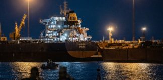 U.S. crude tops $100 and the S&P 500 approaches correction as Iran war enters second month