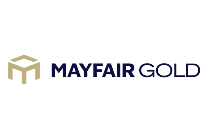 Investor Insight
Mayfair Gold is progressing its 100 percent-owned Fenn-Gib gold project toward production, with a development plan anchored by a robust 2026 pre-feasibility study (PFS). The company’s strategy emphasizes a smaller scale mine designed to accelerate permitting through Ontario’s One Project One Process platform and exploit near surface high-margin ounces in a capital efficient manner. The PFS only corresponds to 24 percent of the indicated gold resource leaving meaningful optionality for long term growth coupled with exploration upside across a broader land package.
Overview
Mayfair Gold (TSXV:MFG,NYSE American:MINE) is a development-stage company with the primary objective of advancing the Fenn-Gib gold project — a large, bulk-tonnage open-pit deposit located in one of Canada’s most prolific gold districts. The company’s technical team is executing on provincial permitting, Indigenous consultation, engineering and ongoing exploration to expand mineralization beyond the current pit constraints.
<em><em>Mayfair Gold’s flagship Fenn-Gib gold project is located within the established Timmins Gold District in Ontario, which has produced more than 100 million ounces of gold historically. </em></em>
The PFS, prepared in accordance with NI 43-101 standards and filed in January 2026, outlines a base-case economic model with an after-tax NPV (5 percent) of C$652 million and an IRR of 24 percent, using conservative gold prices, and demonstrates rapid payback potential. Under a spot price scenario, project economics improve markedly, underscoring the asset’s leverage to higher gold prices. With over $200 million in annual free cash flow once in operation the company will have a robust source of capital to fund growth initiatives.
Company Highlights
<strong>Robust Pre-feasibility Study:</strong> The 2026 PFS highlights compelling returns on a modest initial throughput design while leveraging a large resource base.
<strong>High-grade Early Focus:</strong> The staged plan targets higher-grade, near-surface material to optimize permitting timelines, construction risk, financing, and ultimately accelerate value capture.
<strong>Strategic Location:</strong> Fenn-Gib sits on the highly prospective Timmins Gold District, Ontario — a tier-one mining jurisdiction with established infrastructure and a long history of mining-related activity and supportive communities.
<strong>Strong Financial Backing:</strong> The company has a committed shareholder base, including Muddy Waters, Heeney Capital, Oaktree and Vestcor. With a tight share structure and strong Insider ownership of 35% there is clear alignment for long-term shareholder value creation.
<strong>Exploration Optionality:</strong> Mineralization at Fenn-Gib remains open at depth and along strike, with multiple underexplored targets identified across the property. This includes a Southern Block that has not been explored but sits directly on the prolific Porcupine-Destor fault.
<strong>Long-term optionality:</strong> With a truncated timeline to production the company will be in an advantageous spot for growth initiatives that can be funded with free cash flow.
<strong>CEO Nick Campbell,</strong> heads a technically strong and capital-markets-savvy team with a demonstrated ability to unlock value from high-quality gold assets (previously at Artemis Gold and Silvercrest Metals) and position projects for long-term growth.
<strong>COO Drew Anwyll </strong>is an experienced mine builder; he successfully permitted the Marathon PGM project in Ontario and was a senior executive during the construction, commissioning and start-up of Detour Lake, Canada’s largest gold mine.
Key Project
Fenn-Gib Gold Project
Fenn-Gib is Mayfair’s flagship asset, encompassing a significant indicated mineral resource of 181.3 million tonnes grading 0.74 g/t gold for 4.3 million contained ounces, and additional inferred ounces. The project benefits from excellent access via Highway 101 and proximity to regional mining services.
The 2026 PFS centers on a 4,800 tonnes-per-day open-pit operation designed to process approximately 1.04 million ounces of gold, representing 24 percent of the total resource and reflecting a conservative, execution-oriented approach. Highlights from the study include:
After-tax NPV of C$1.37 billion and IRR of 38 percent at current spot gold prices.2.7-year payback period on initial capital costs under the base case (1.7 year payback at January 2026 prices)
In addition to economic studies and active dialogue with Indigenous stakeholders, the company has executed engineering contracts with industry providers to support mine planning, processing design, environmental baseline work, and tailings/water management — positioning the project for upcoming permitting and potential construction decision milestones.
Exploration Potential
Beyond the defined pit shell, Fenn-Gib hosts multiple zones including the Main Zone, Deformation Zone, and Footwall Zone, with geological continuity extending along strike and at depth. Newly identified targets such as the Southern Block along the Porcupine Destor-Fault present opportunities for future discovery drilling and resource expansion.
Management Team
Nicholas Campbell — Chief Executive Officer
Nicholas Campbell is a mining executive with more than 20 years of experience across capital markets, corporate development, and mine development. Prior to joining Mayfair, he served as vice-president of Capital Markets at Artemis Gold, executive vice-president of business development at SilverCrest Metals, and chief financial officer of Goldsource Mines. Campbell leads Mayfair’s strategic vision and execution as the company transitions Fenn‑Gib into a defined development stage.
Drew Anwyll — Chief Operating Officer
Drew Anwyll is a professional engineer with over 30 years of global mining experience in both project and operations leadership. His background includes senior technical and operating roles at Generation Mining, Detour Gold, Barrick Gold and Placer Dome. Anwyll’s track record includes leadership through permitting, construction, commissioning, and operational phases, anchoring Mayfair’s operational planning and execution.
Zayem Lakhani — Vice-president, Capital Markets
Zayem Lakhani brings more than 17 years of expertise in investment management, equity research, and corporate development. Before joining Mayfair, he served as portfolio manager and head of Canadian equities at HSBC Global Asset Management, where he oversaw the investment process for approximately $4 billion in capital across diverse strategies. Lakhani brings a unique network and an investor’s perspective to help position the company’s story.
Darren Prins — Interim Chief Financial Officer
Darren Prins is a senior financial executive with extensive experience in corporate development, capital markets, mergers and acquisitions, financial reporting, risk management, budgeting, forecasting, and international tax planning. Prins has served as CFO for TSX, TSXV and NYSE‑listed companies across multiple industries, bringing strong financial stewardship to Mayfair’s funding and reporting functions.
This post appeared first on investingnews.com